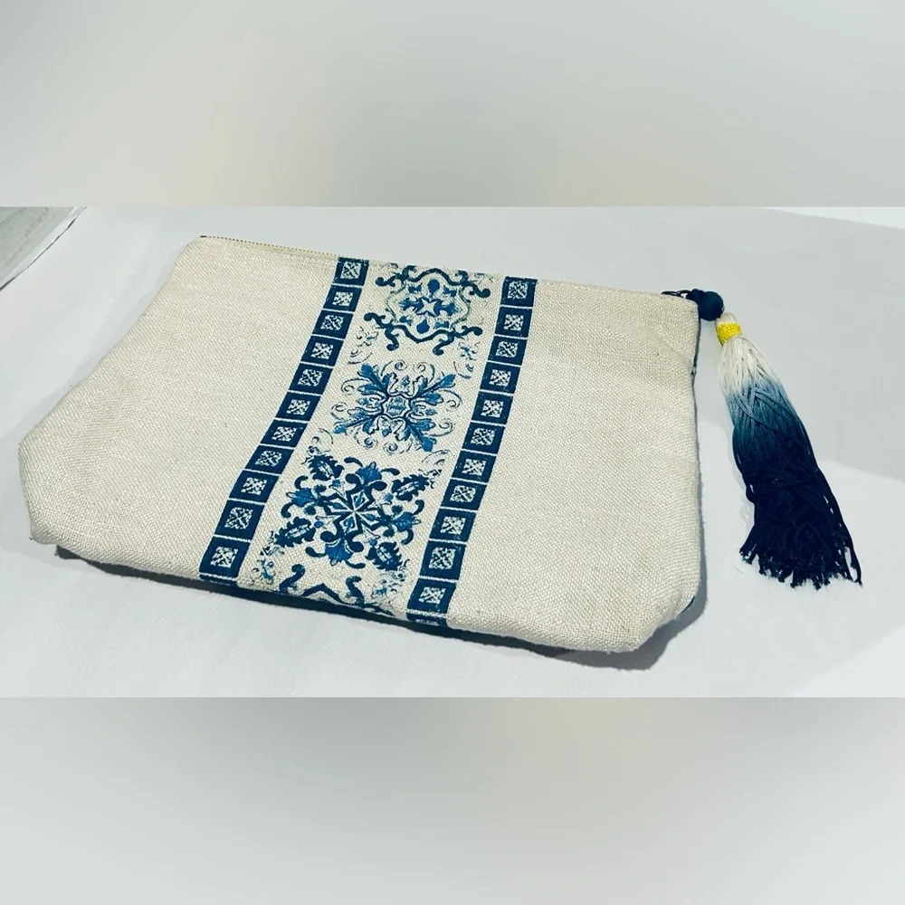 Artsy oversized tasseled anthropology clutch purse zipper closure